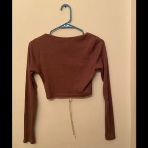 Brown long sleeve crop top.